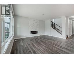 Family room - 83 Red Sky Gardens Ne, Calgary, AB T3N1N1 Photo 13