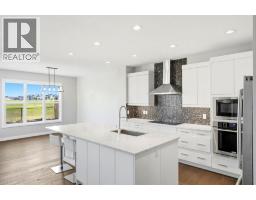 Primary Bedroom - 290 Masters Avenue Se, Calgary, AB T3M2C1 Photo 12