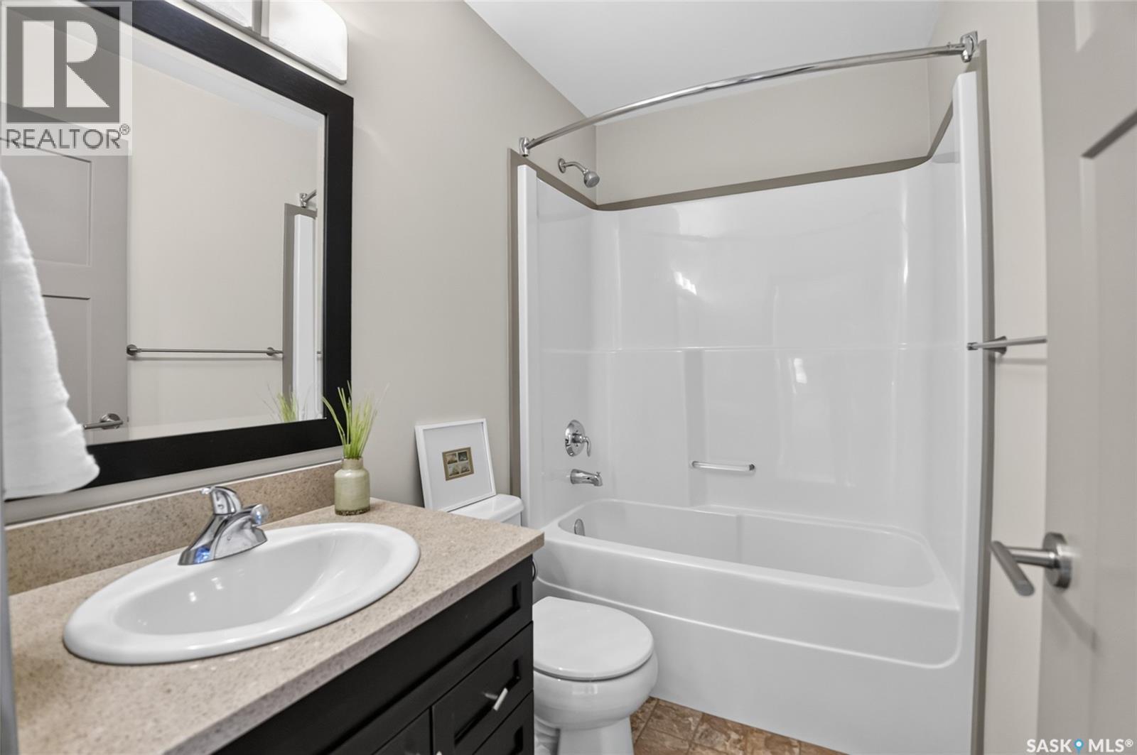 202 Maningas BEND, Saskatoon — photo 35