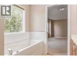 109 Hidden Creek Gardens Nw, Calgary, AB T3A6J4 Photo 26