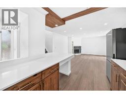205, 829 Coach Bluff Crescent Sw, Calgary, AB T3H1B1 Photo 9