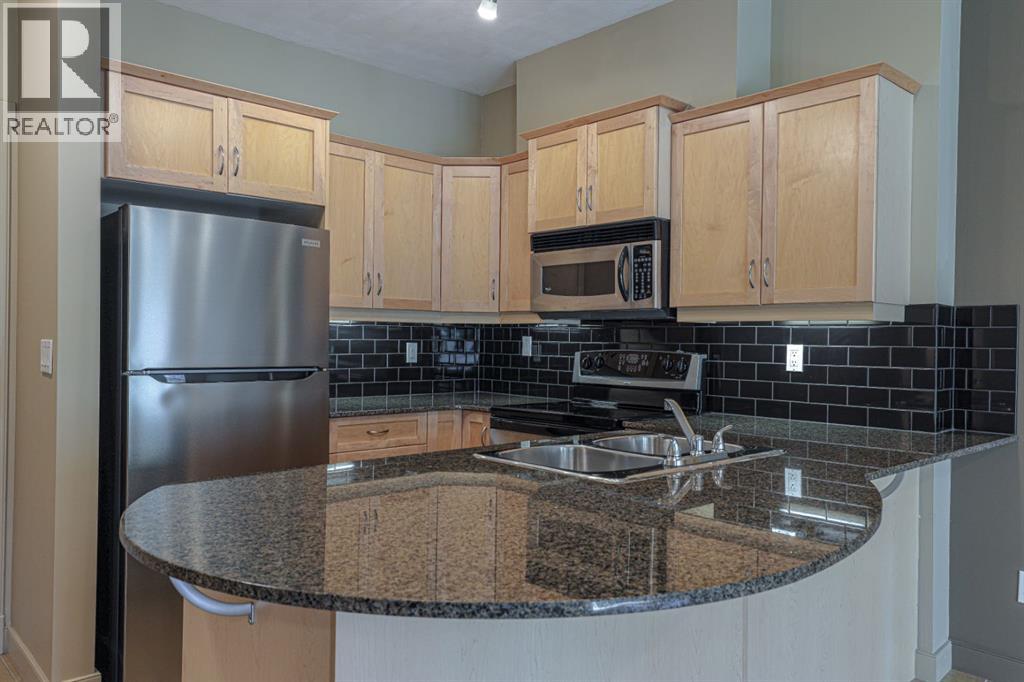 1305, 11811 Lake Fraser Drive SE, Calgary, Alberta, T2J7J1 — thumbnail 3