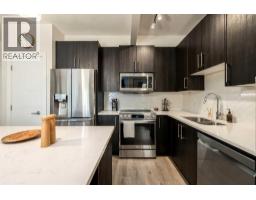 Primary Bedroom - 122, 4 Sage Hill Terrace Nw, Calgary, AB T3R0W4 Photo 6