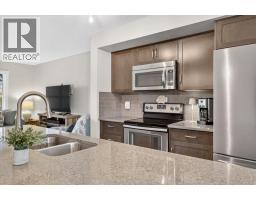 Bedroom - 40 Sunvalley Road, Cochrane, AB T4C0X6 Photo 11