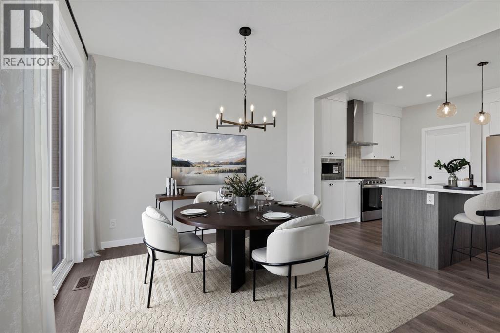 Dining room with oversized sliding glass doors to the back yard