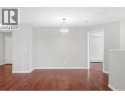 Kitchen - 102, 17 Country Village Bay Ne, Calgary, AB T3K5Z3 Photo 6