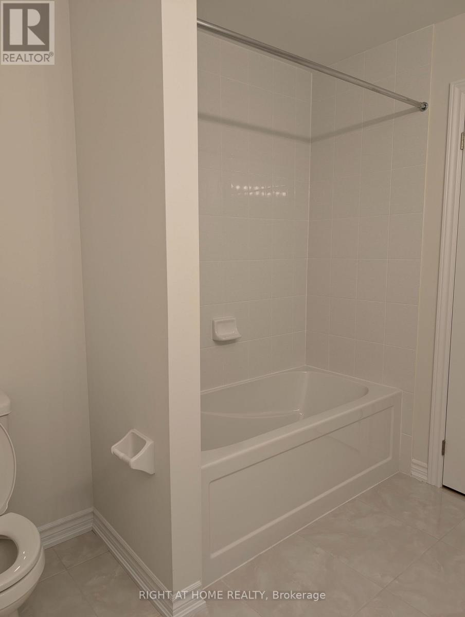 1052 PERIWINKLE CRESCENT, Woodstock (Woodstock - North) — photo 12