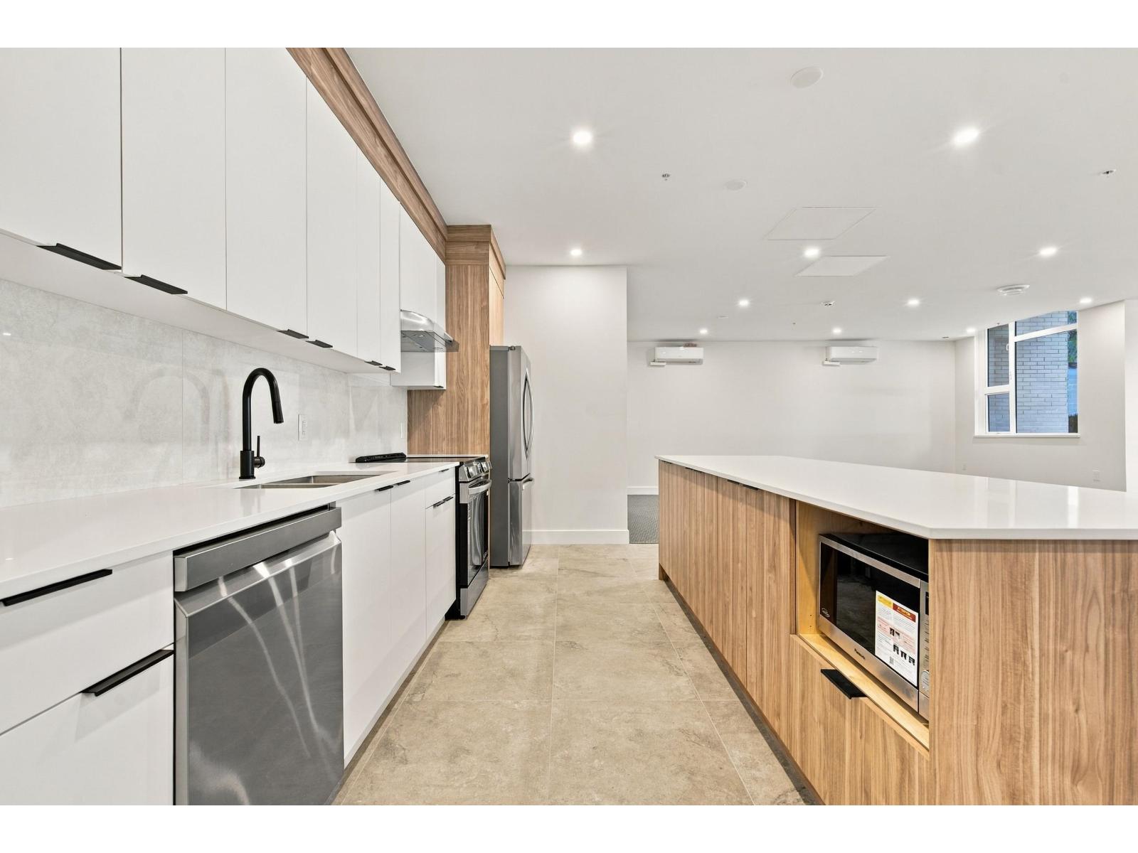 Photo of 211 14398 60 AVENUE 15