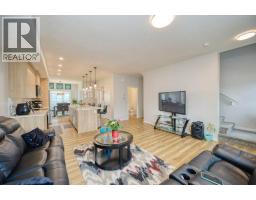 Living room - 50 Cranbrook Gardens Se, Calgary, AB T3M3N9 Photo 12