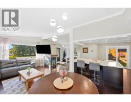 Family room - 5 Lake Huron Bay Se, Calgary, AB T2J5J6 Photo 11