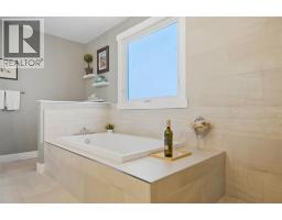 Laundry room - 5 Lake Huron Bay Se, Calgary, AB T2J5J6 Photo 13