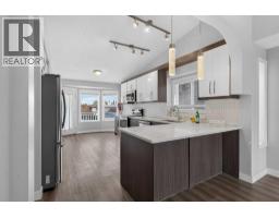 Living room - 48 Shawfield Road Sw, Calgary, AB T2Y1Y7 Photo 7
