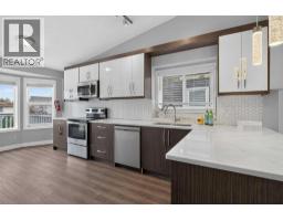 Primary Bedroom - 48 Shawfield Road Sw, Calgary, AB T2Y1Y7 Photo 8