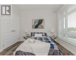 420 - 610 Farmstead Drive, Milton, ON L9T8X5 Photo 13