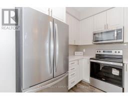 420 - 610 Farmstead Drive, Milton, ON L9T8X5 Photo 6
