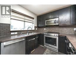 Bedroom - 702 Panamount Boulevard Nw, Calgary, AB T3K0P7 Photo 7