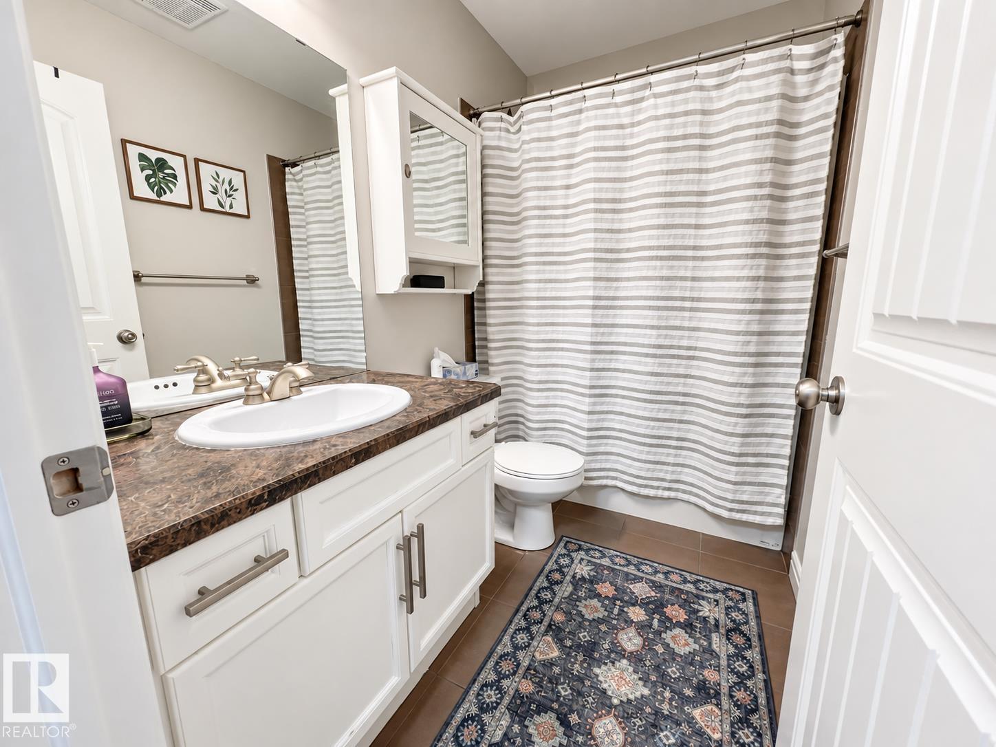 8431 SLOANE CR NW - Image 15