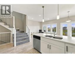 Family room - 814 Kensington Boulevard, Saskatoon, SK S7L6C6 Photo 11