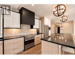 201 - 77 Yates Street, St  Catharines, ON L2R5R7 Photo 9