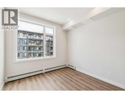 Laundry room - 3301, 3700 Seton Avenue Se, Calgary, AB T3M4J1 Photo 8