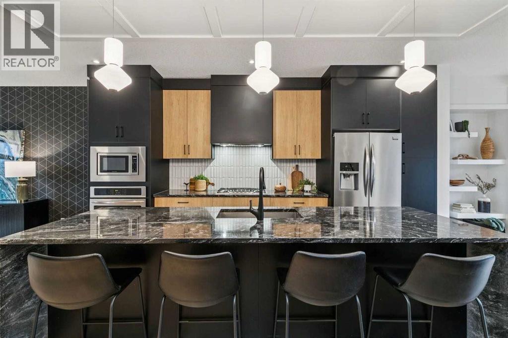 Matte Black & Warm Oak-Toned Kitchen for a Modern, Elevated Finish