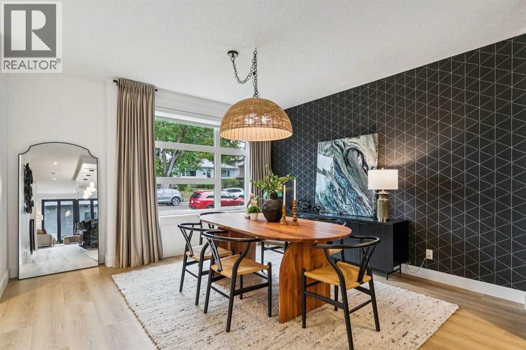 Statement Oversized Rope Pendant Paired with a Striking Designer Wallpaper Feature Wall