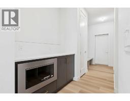 105 Osprey Hill Way Sw, Calgary, AB T3B5T2 Photo 21