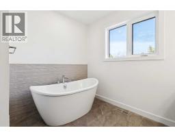 105 Osprey Hill Way Sw, Calgary, AB T3B5T2 Photo 30