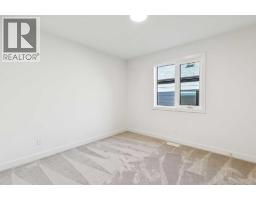 105 Osprey Hill Way Sw, Calgary, AB T3B5T2 Photo 37