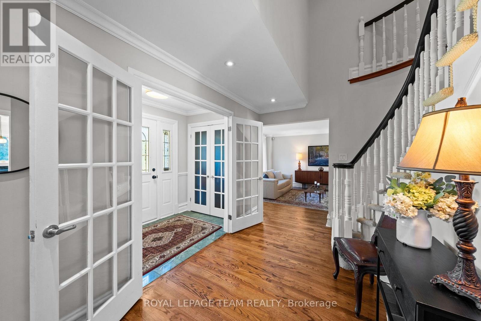 Front Entry w/ Double Closets and French Doors