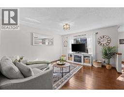 Living room - 624 Cranston Drive Se, Calgary, AB T3M0B6 Photo 6