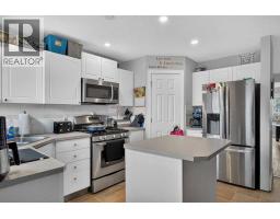 Family room - 162 Bridlewood Avenue Sw, Calgary, AB T2Y3T5 Photo 11
