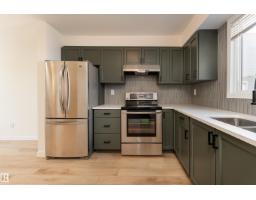 Laundry room - #10 1415 62 St Nw, Edmonton, AB T6L4K1 Photo 10