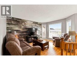 Living room - 104 Dickey Bay, Fort Mcmurray, AB T9K2L4 Photo 8