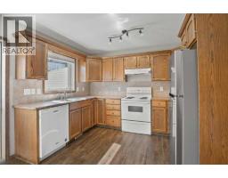 Bedroom - 127 - 129 Lyons Close, Red Deer, AB T4R3P6 Photo 7