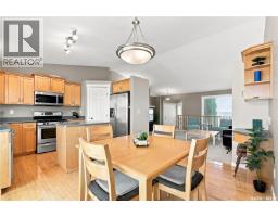 Family room - 410 Bourgonje Court, Saskatoon, SK S7S1L7 Photo 9