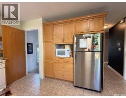 Laundry room - 212 Ash Drive, Weyburn, SK S4H0S2 Photo 7