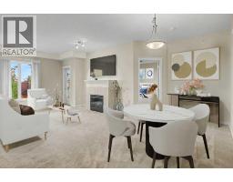 Living room - 205, 15 Everstone Drive Sw, Calgary, AB T2Y5B5 Photo 11
