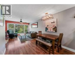 Living room - 110 Beaconsfield Road Nw, Calgary, AB T3K1X9 Photo 8