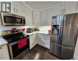 Laundry room - 221 Bean Crescent, Weyburn, SK S4H3A3 Photo 9