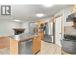 Family room - 209 Tuscany Ravine Road Nw, Calgary, AB T3L2W9 Photo 7