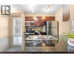7202, 403 Mackenzie Way SW - photo 1