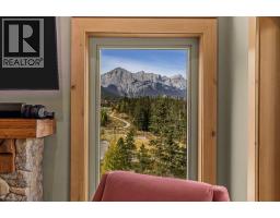 Primary Bedroom - 101, 102 Stewart Creek Rise, Canmore, AB T1W0E3 Photo 13