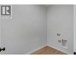 2pc Bathroom - 107 Bartlett Row Se, Calgary, AB T3M2N8 Photo 6