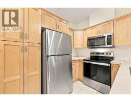 Primary Bedroom - 114, 1414 17 Street Se, Calgary, AB T2G5S6 Photo 6
