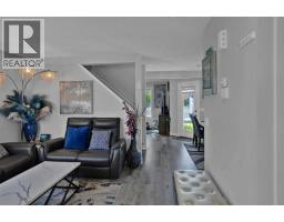 Living room - 254 Hidden Spring Mews Nw, Calgary, AB T3A5N3 Photo 6