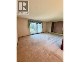 Family room - 5409 57 Street, Taber, AB T1G1L7 Photo 9