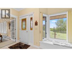 Living room - 100, 80054 226 Avenue W, Rural Foothills County, AB T1S2Z1 Photo 6