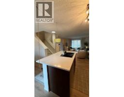 2pc Bathroom - 102 Panatella Park Nw, Calgary, AB T3K6K4 Photo 9