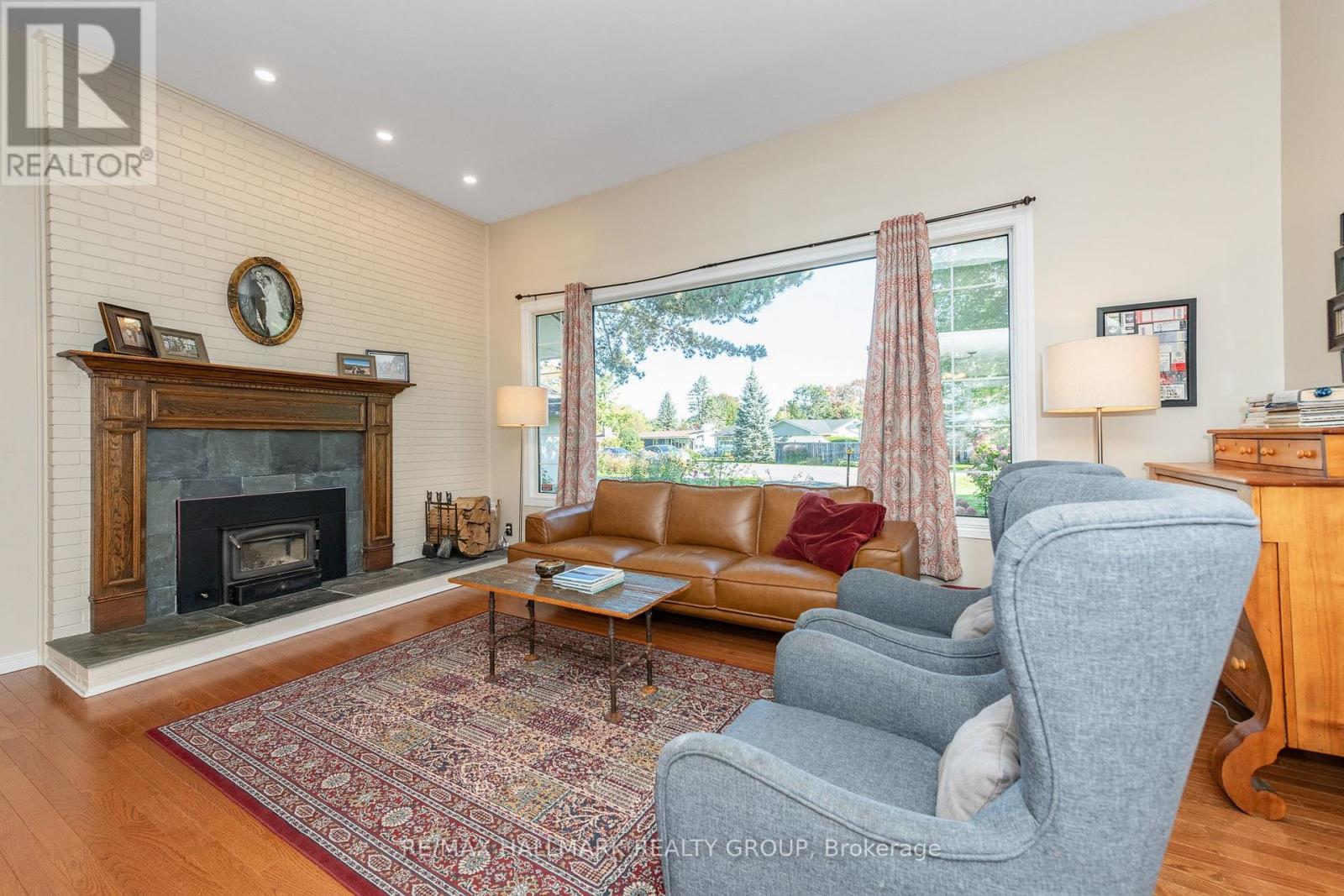 Living room with air tight wood insert.